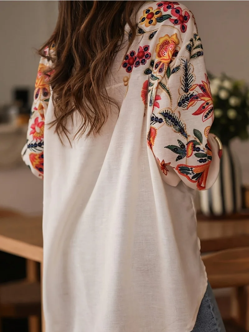 Outzidr  Off White Bishop Sleeve Front Buttoned Embroidered Top for Women | Best Price UAE
